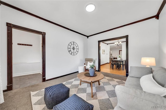 397 14th St, Buffalo, NY 14213 - living area with a chandelier, ornamental molding, carpet flooring, and baseboards