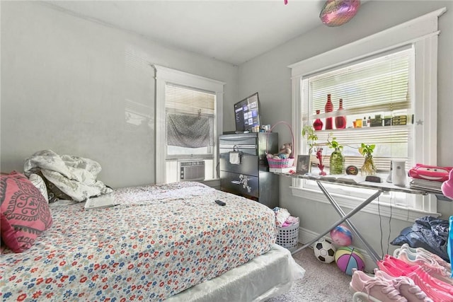 118 Electric Ave, Rochester, NY 14613 - carpeted bedroom featuring multiple windows, cooling unit, and baseboards