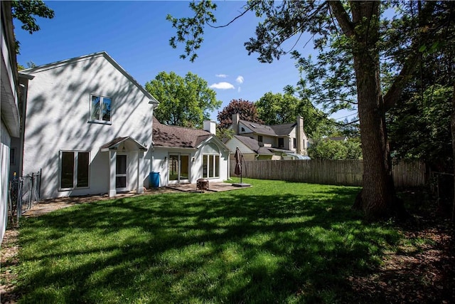 rear view of property with a patio