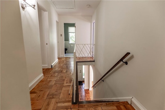 stairway with baseboards