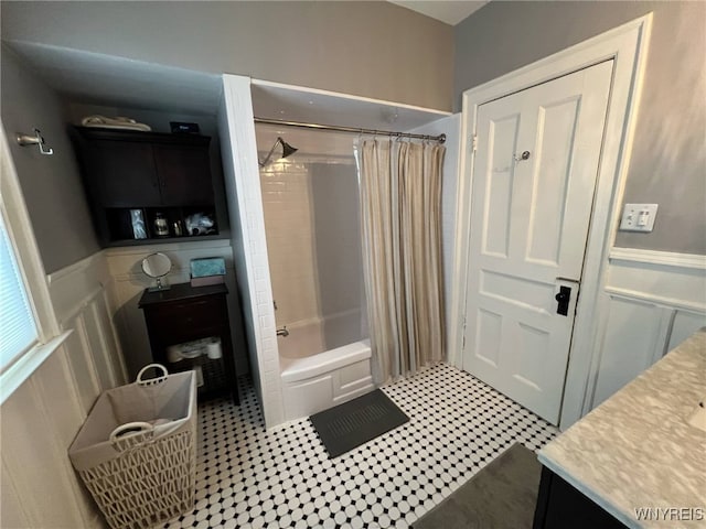 536 Potomac Ave, Buffalo, NY 14222 - bathroom with shower / bath combo, vanity, wainscoting, and a decorative wall