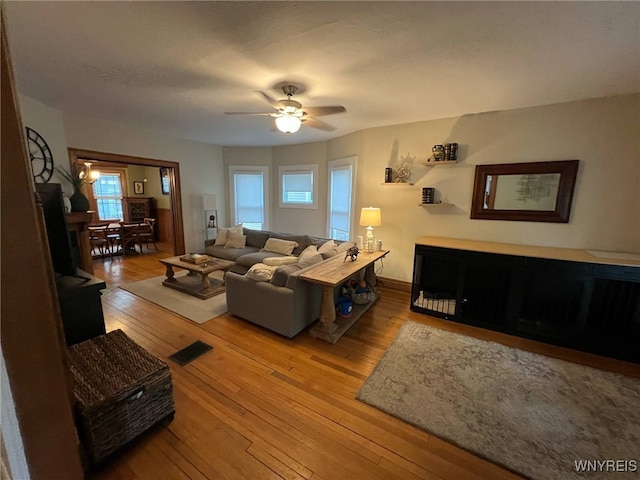 536 Potomac Ave, Buffalo, NY 14222 - living area with light wood finished floors, ceiling fan, and plenty of natural light
