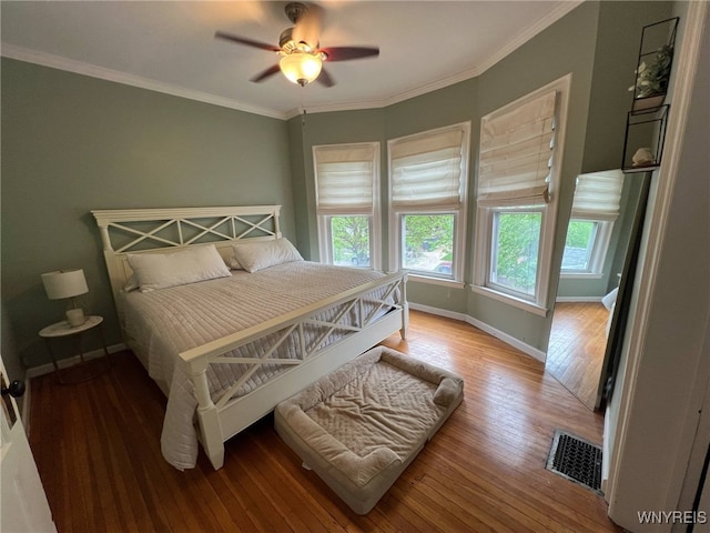 536 Potomac Ave, Buffalo, NY 14222 - bedroom featuring wood-type flooring, baseboards, ornamental molding, and ceiling fan