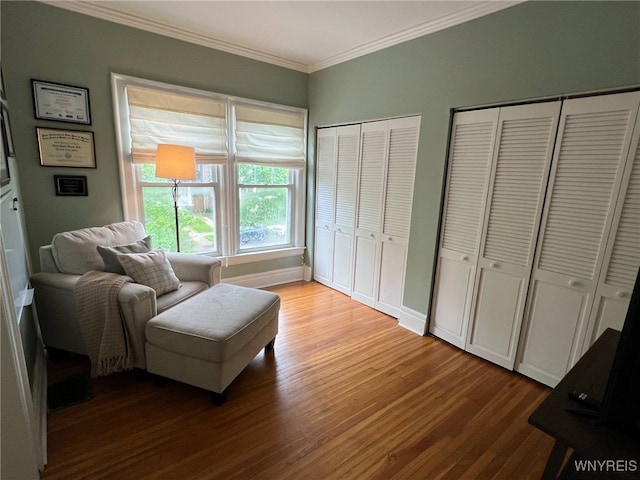 536 Potomac Ave, Buffalo, NY 14222 - sitting room with wood finished floors and ornamental molding