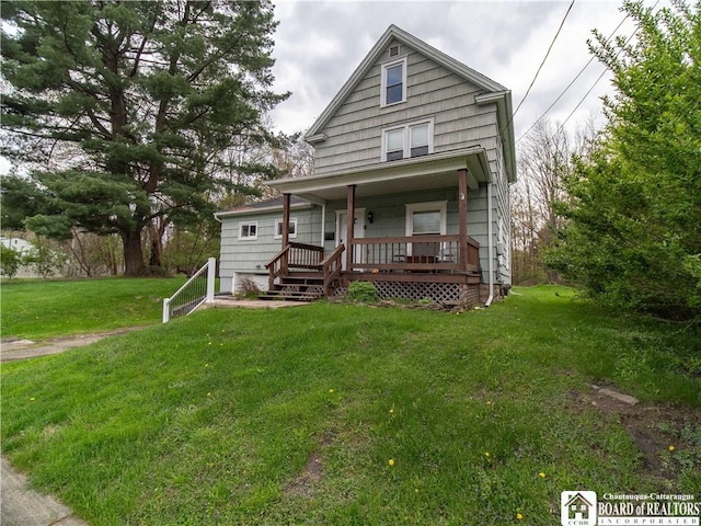 78 Benson St, Jamestown, NY 14701 - shotgun-style home with a porch and a front lawn