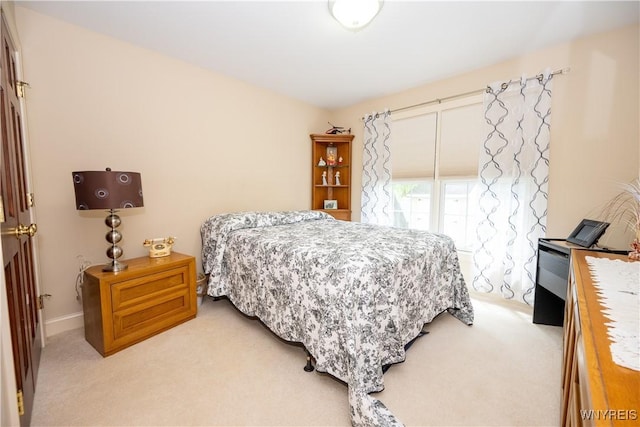 5067 William St, Lancaster, NY 14086 - bedroom with light colored carpet and baseboards