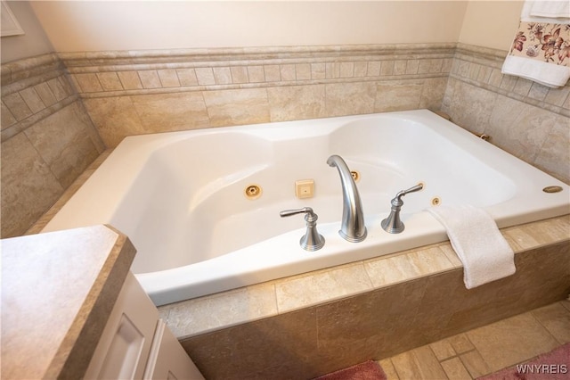 5067 William St, Lancaster, NY 14086 - bathroom featuring a tub with jets