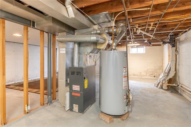 utility room with water heater and heating unit