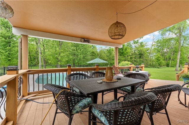 1210 Lake Rd, Oneida-Outside, NY 13421 - deck with outdoor dining area and view of wooded area
