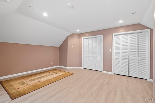 1210 Lake Rd, Oneida-Outside, NY 13421 - additional living space with vaulted ceiling, light wood finished floors, baseboards, and recessed lighting