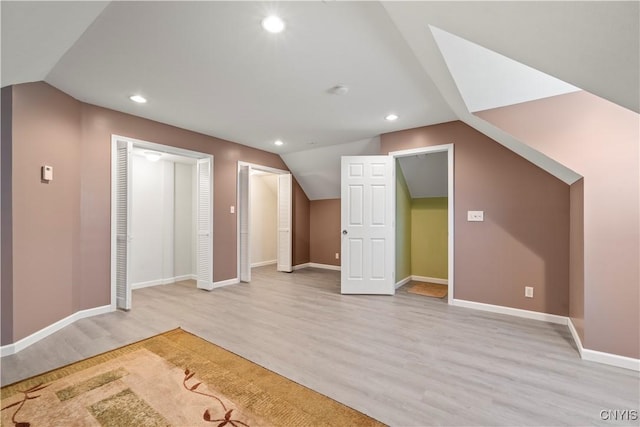 1210 Lake Rd, Oneida-Outside, NY 13421 - bonus room featuring vaulted ceiling, light wood-style floors, baseboards, and recessed lighting