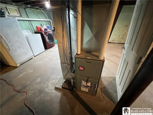 319 Ericsson Rd, Poland, NY 14747 - utility room with washer and clothes dryer
