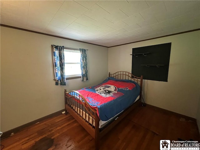 319 Ericsson Rd, Poland, NY 14747 - bedroom with crown molding and wood finished floors