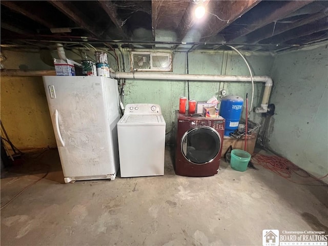 319 Ericsson Rd, Poland, NY 14747 - unfinished basement with a water pressure tank, freestanding refrigerator, and washer and dryer