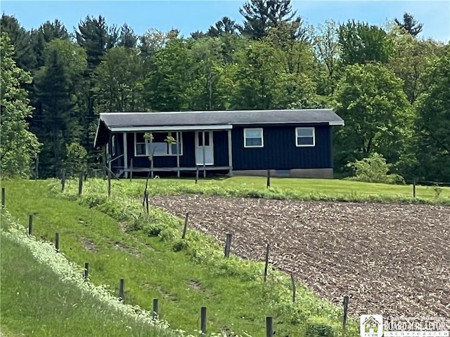 319 Ericsson Rd, Poland, NY 14747 - view of front facade featuring covered porch
