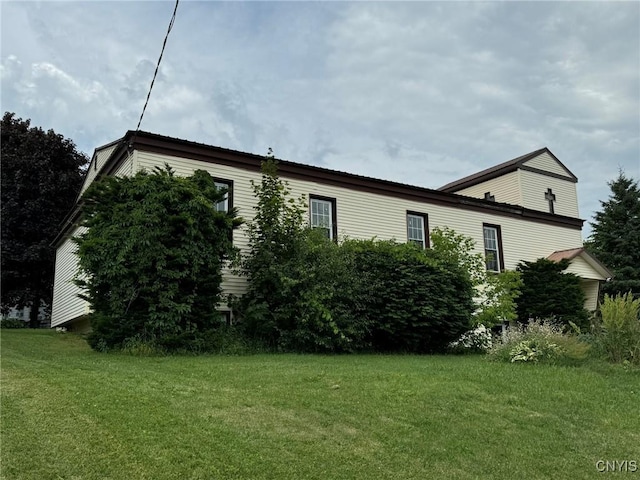 170 Maple St, Massena, NY 13662 - view of side of home featuring a lawn