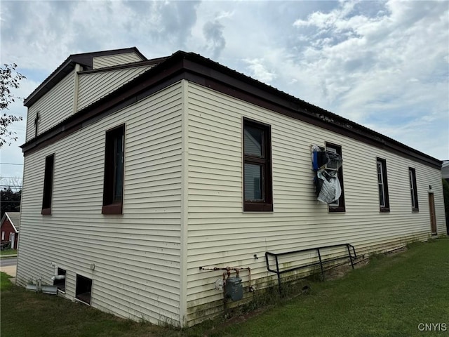 170 Maple St, Massena, NY 13662 - view of side of home with a yard