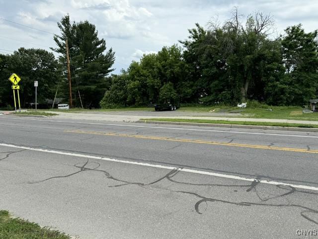 170 Maple St, Massena, NY 13662 - view of asphalt street featuring traffic signs