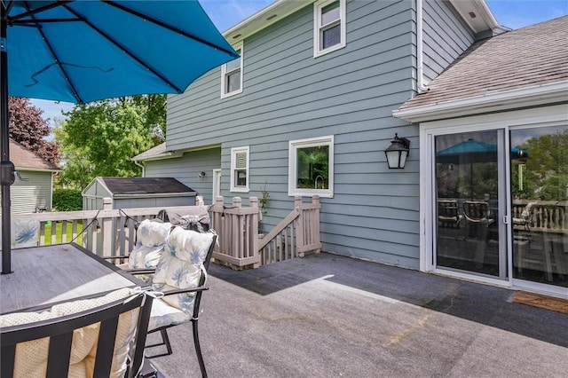 view of patio with a wooden deck