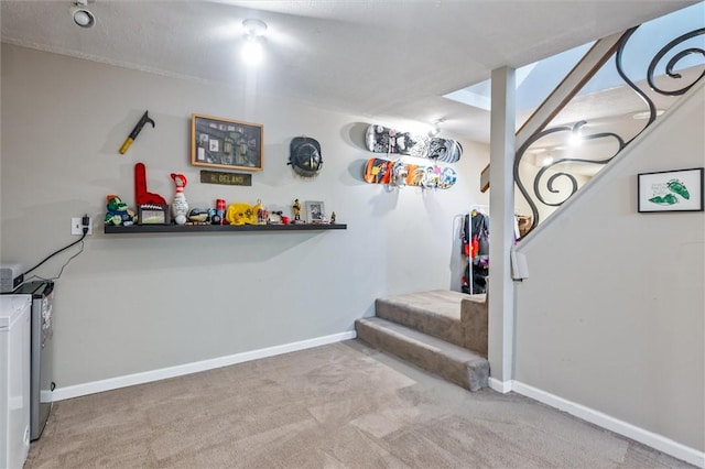 staircase with carpet floors and baseboards