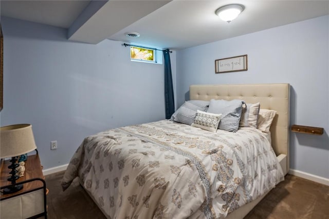 carpeted bedroom with baseboards