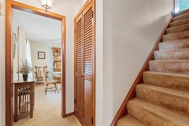 104 Hillside, Camillus, NY 13031 - stairs with wallpapered walls, carpet, and baseboards