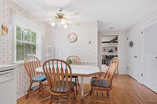 104 Hillside, Camillus, NY 13031 - dining space featuring wallpapered walls, light wood-style flooring, and ceiling fan