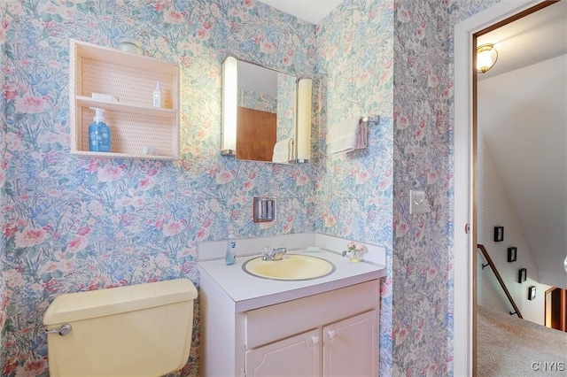 104 Hillside, Camillus, NY 13031 - half bath featuring toilet, vanity, and wallpapered walls