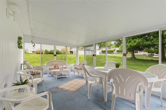 104 Hillside, Camillus, NY 13031 - sunroom featuring vaulted ceiling, outdoor dining area, and an outdoor hangout area