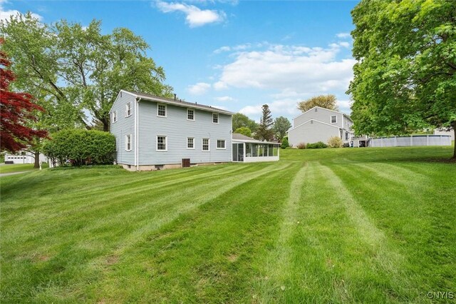 104 Hillside, Camillus, NY 13031 - rear view of property featuring a yard and a sunroom