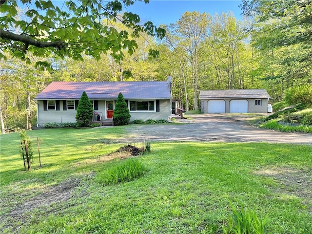 4600 College Ave, Corning, NY 14830 - ranch-style house with an outbuilding, a garage, and a front yard