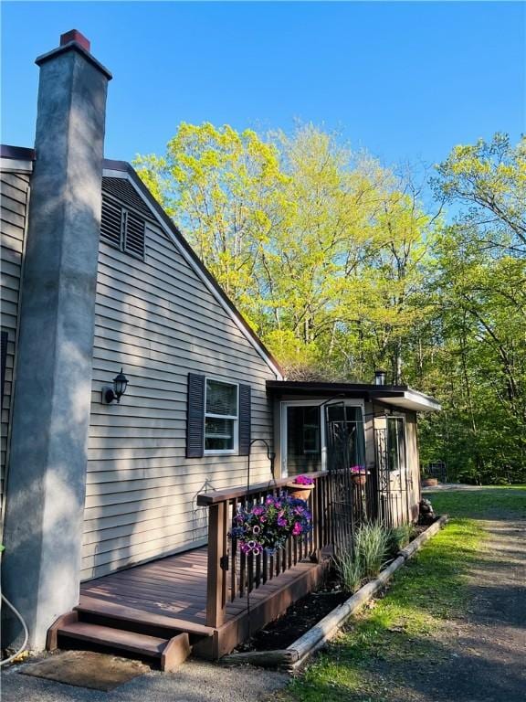 4600 College Ave, Corning, NY 14830 - rear view of property featuring a wooden deck and a chimney