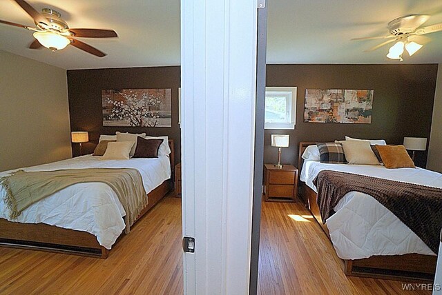 458 Kenwood Dr, Lewiston, NY 14092 - bedroom with light wood-type flooring and ceiling fan