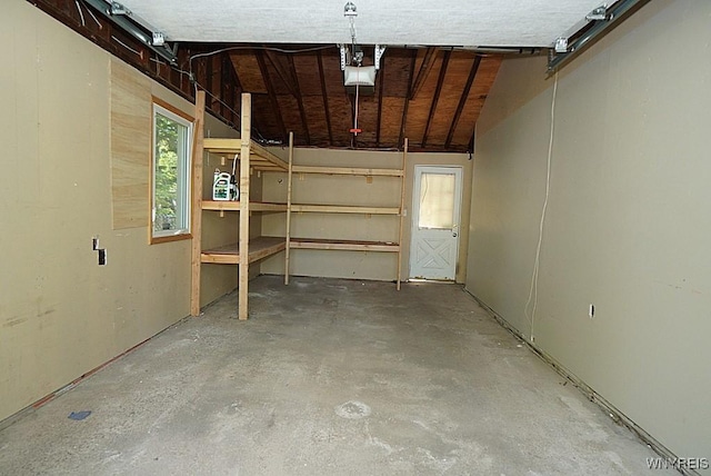 458 Kenwood Dr, Lewiston, NY 14092 - garage featuring a garage door opener