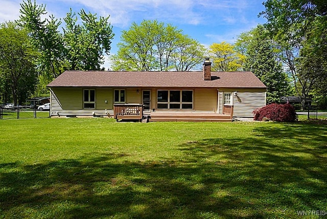 458 Kenwood Dr, Lewiston, NY 14092 - rear view of property with a deck and a chimney