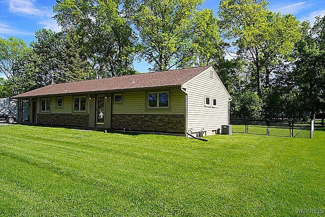 458 Kenwood Dr, Lewiston, NY 14092 - view of front of home with stone siding and central AC