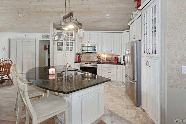 7030 Peckham Rd, Watson, NY 13367 - kitchen with appliances with stainless steel finishes, a sink, wood ceiling, white cabinets, and a kitchen breakfast bar
