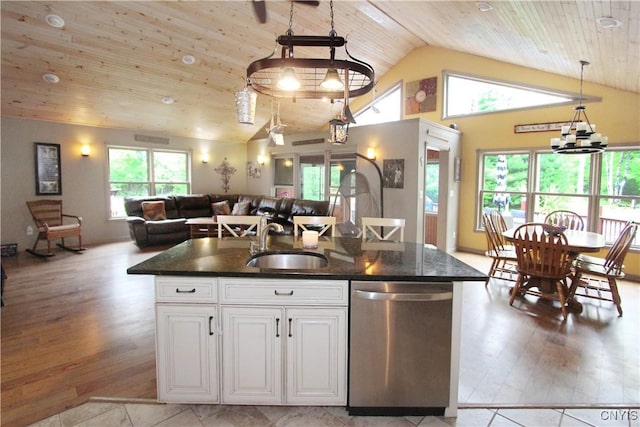 7030 Peckham Rd, Watson, NY 13367 - kitchen with stainless steel dishwasher, a sink, vaulted ceiling, open floor plan, and wooden ceiling