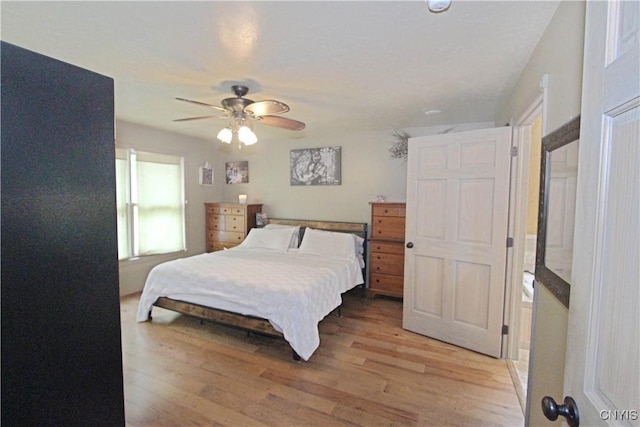 7030 Peckham Rd, Watson, NY 13367 - bedroom with light wood-style floors and ceiling fan