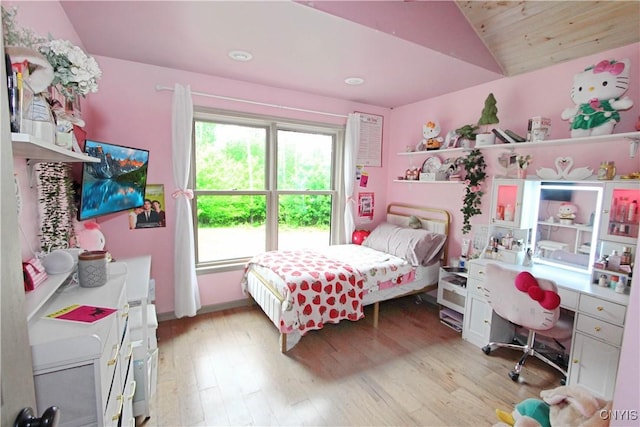 7030 Peckham Rd, Watson, NY 13367 - bedroom with vaulted ceiling, light wood finished floors, an office area, and recessed lighting