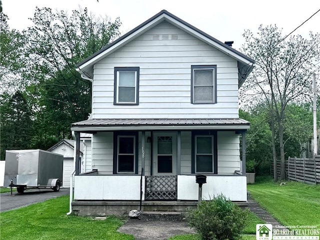 108 S Main St, Evans, NY 14006 - traditional style home featuring covered porch and metal roof