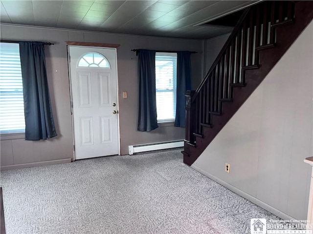 108 S Main St, Evans, NY 14006 - carpeted entryway with baseboard heating, stairway, and baseboards