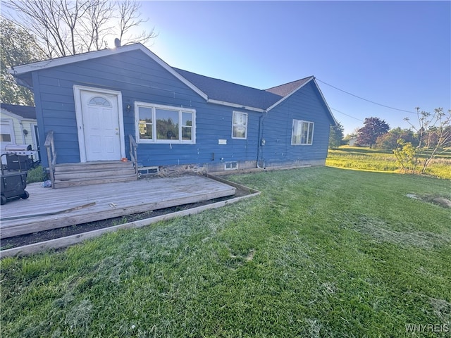 2746 Johnson Creek Rd, Hartland, NY 14105 - rear view of property with a yard and a deck