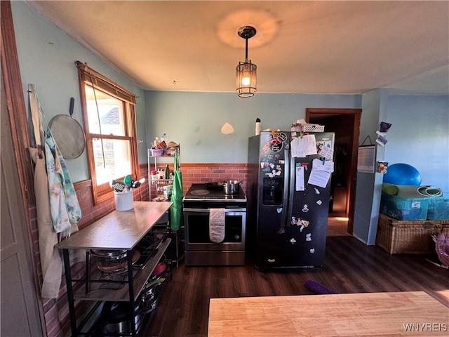 2746 Johnson Creek Rd, Hartland, NY 14105 - kitchen with appliances with stainless steel finishes and dark wood finished floors
