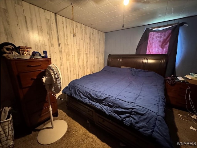 2746 Johnson Creek Rd, Hartland, NY 14105 - bedroom featuring wood walls and carpet