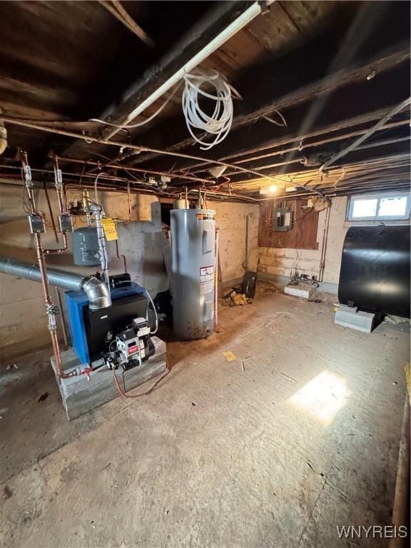 2746 Johnson Creek Rd, Hartland, NY 14105 - below grade area featuring oil tank, electric water heater, and a heating unit