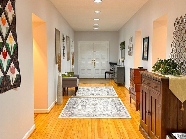 10 Foery Dr Unit 404, Utica, NY 13501 - entryway with light wood-style flooring, baseboards, and recessed lighting