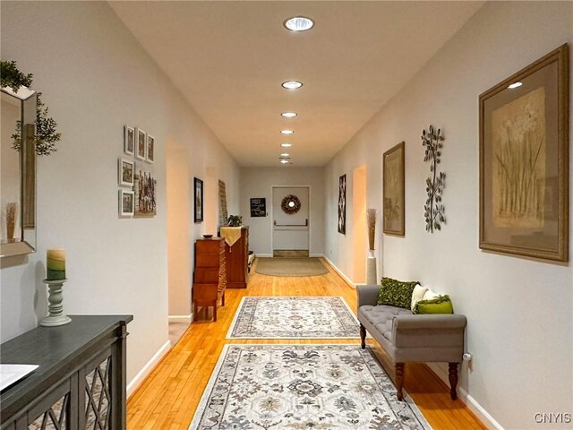 10 Foery Dr Unit 404, Utica, NY 13501 - hallway with recessed lighting, light wood-style flooring, and baseboards