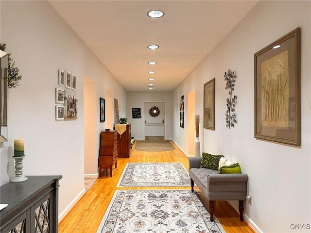 10 Foery Dr Unit 404, Utica, NY 13501 - hall featuring light wood-type flooring, recessed lighting, and baseboards