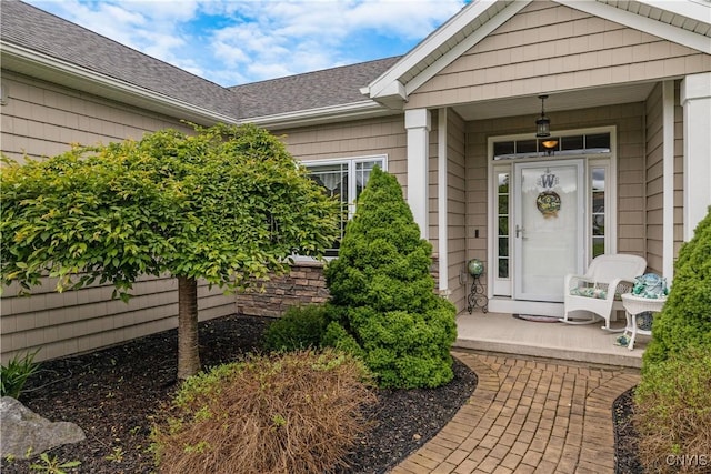 146 Edwards Falls Ln, Manlius, NY 13104 - property entrance featuring covered porch and a shingled roof
